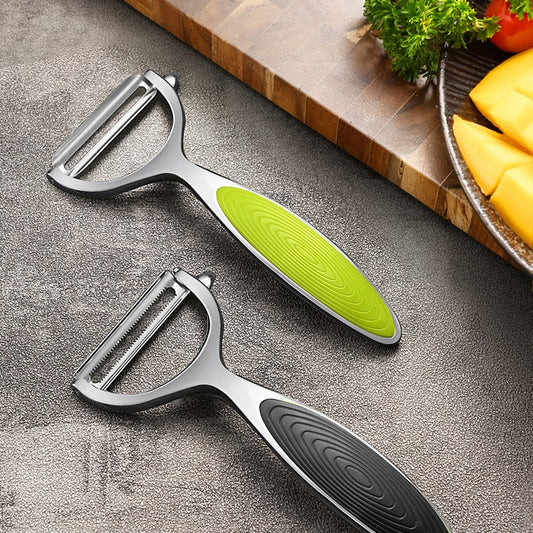 eplucheur vert noir légumes