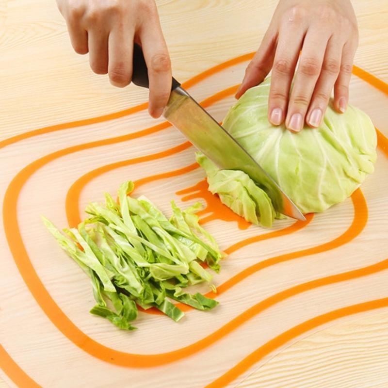 planche a decouper orange découpe salade