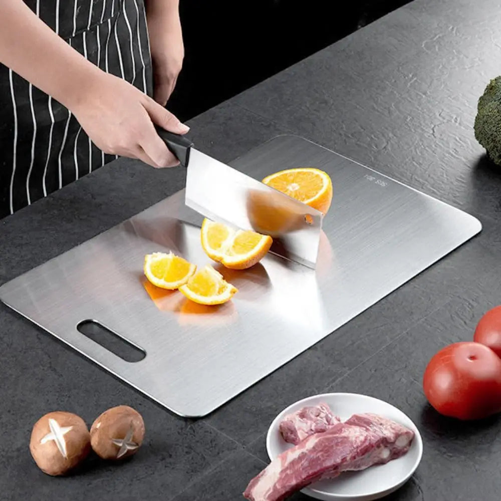 planche decouper oranges legumes